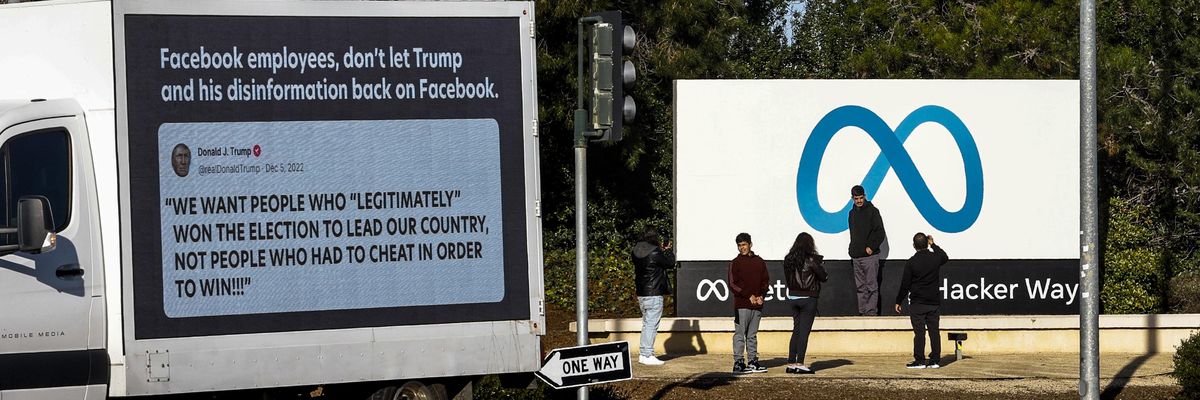 A mobile billboard outside Meta headquarters that reads "Facebook employees, don't let Trump and his disinformation back on Facebook."