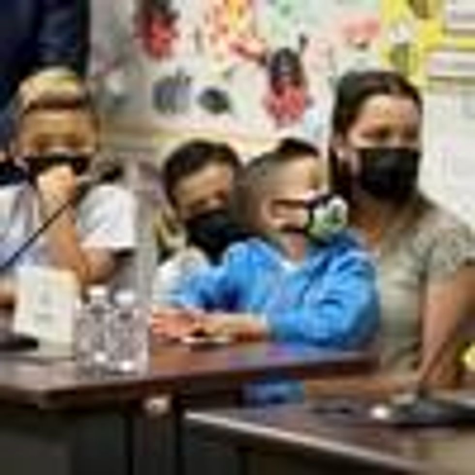 A mother and her children discuss the child tax credit