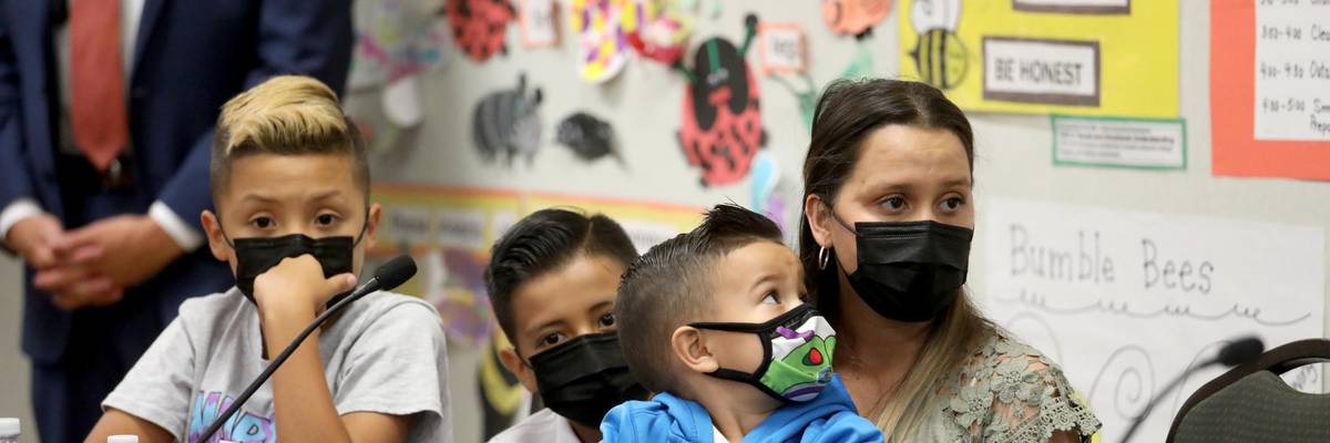 A mother and her children discuss the child tax credit