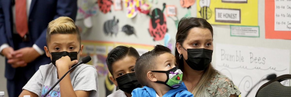 A mother and her children discuss the child tax credit