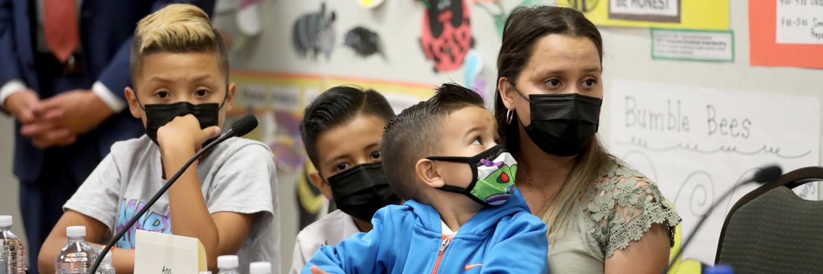 A mother and her children discuss the child tax credit