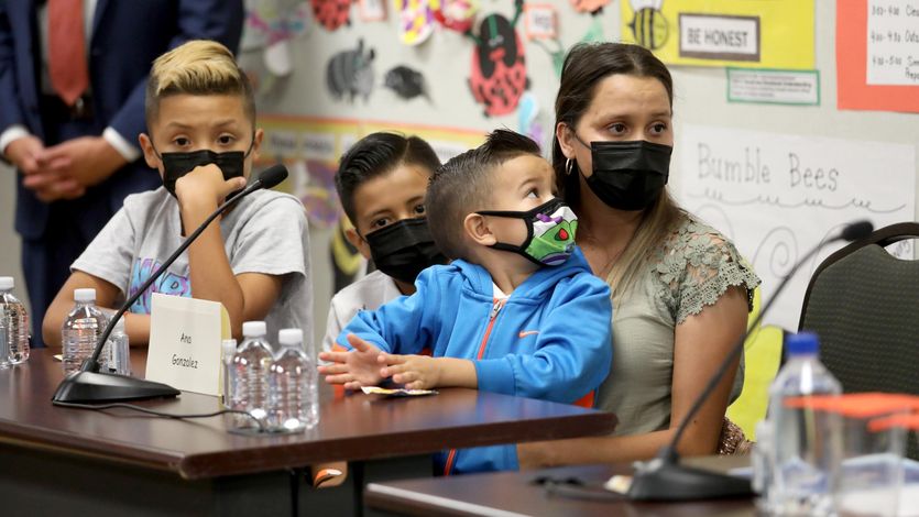 A mother and her children discuss the child tax credit