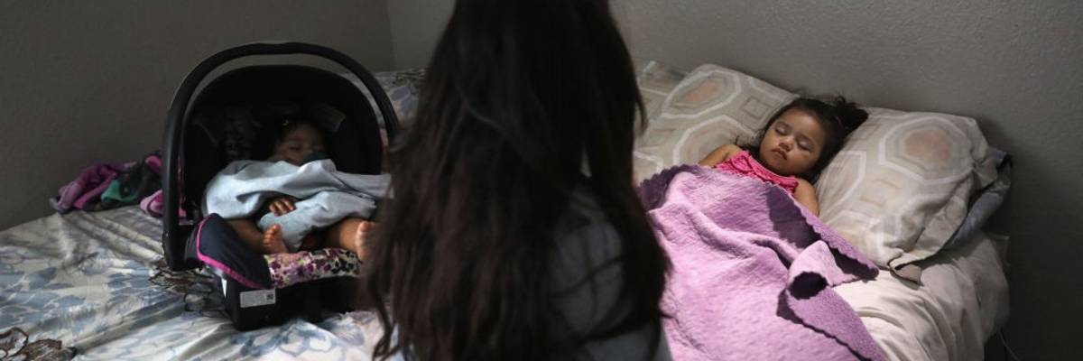 A mother who is undocumented tends to her U.S.-born children