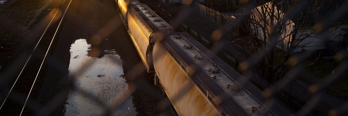 A Norfolk Southern train passes underneath a bridge on February 25, 2023 in East Palestine, Ohio.