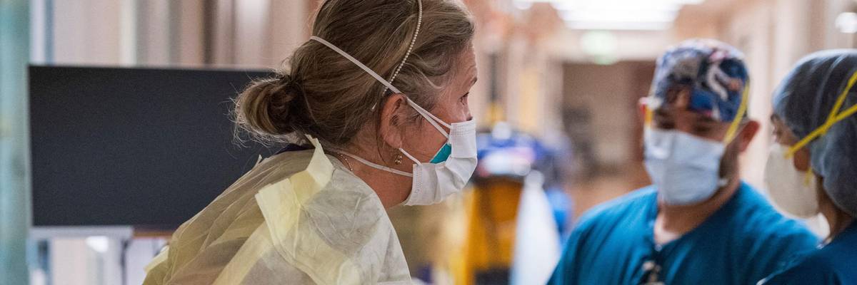 A nurse wearing personal protective equipment