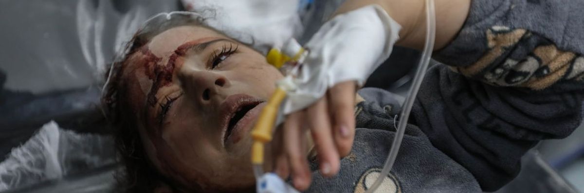 A Palestinian child injured in Israeli airstrikes