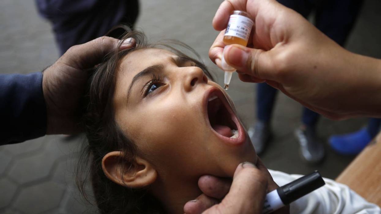 A Palestinian girl received a polio vaccine dose