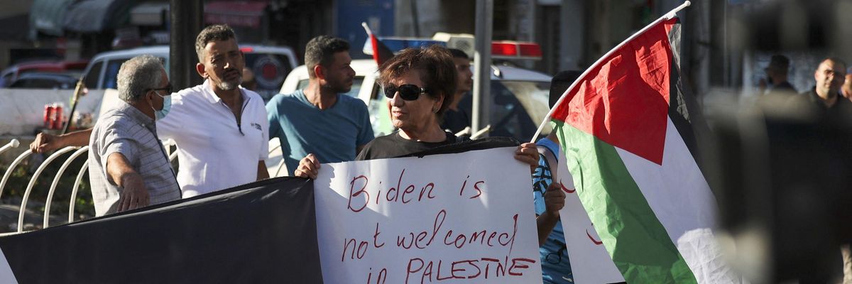A Palestinian protests U.S. President Joe Biden's visit