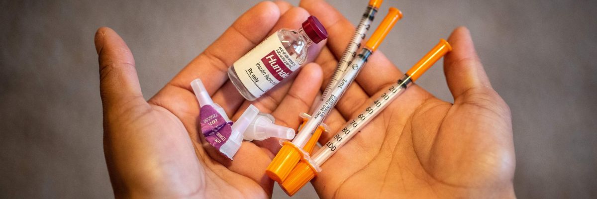 A patient holds insulin