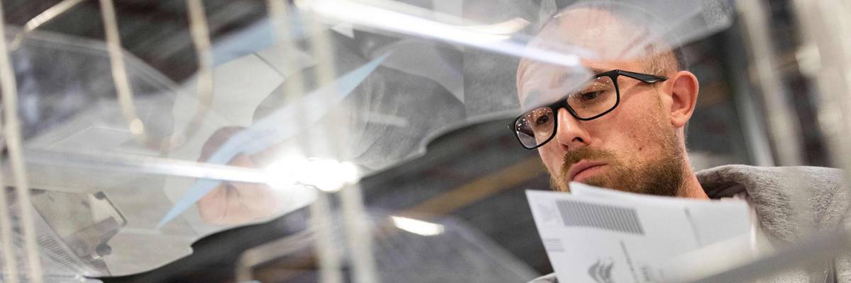 A Pennsylvania election official sorts ballots
