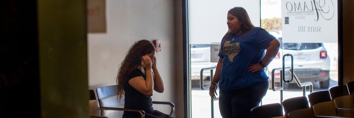 A person at a Texas abortion clinic is informed services are no longer available following the Supreme Court's ruling