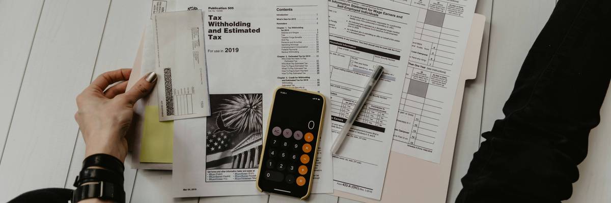 A person gets ready to do taxes.