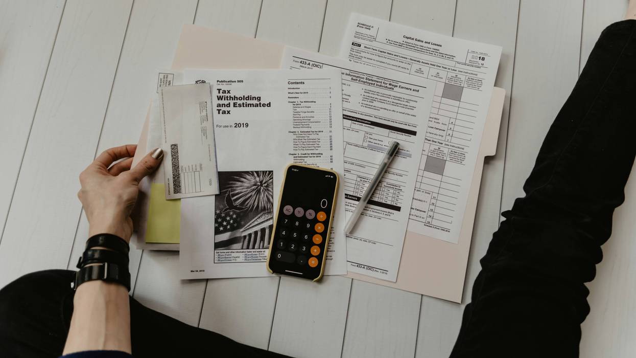 A person gets ready to do taxes.