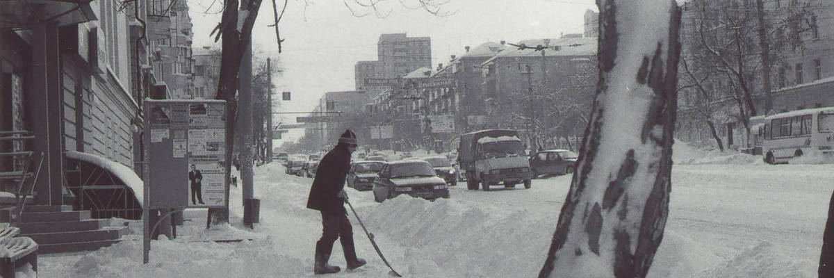 A person shovels snow.