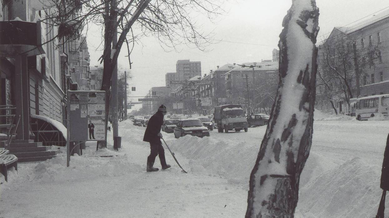 A person shovels snow.