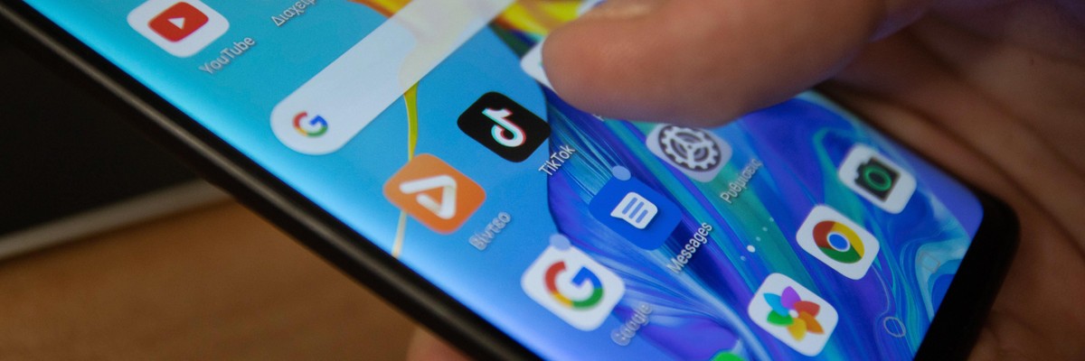 A person uses a smartphone.