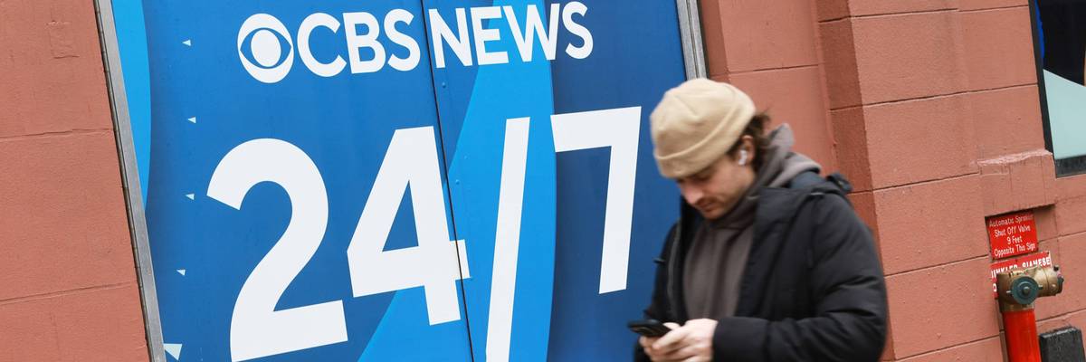 A person walks by the CBS Broadcast Center in Manhattan.