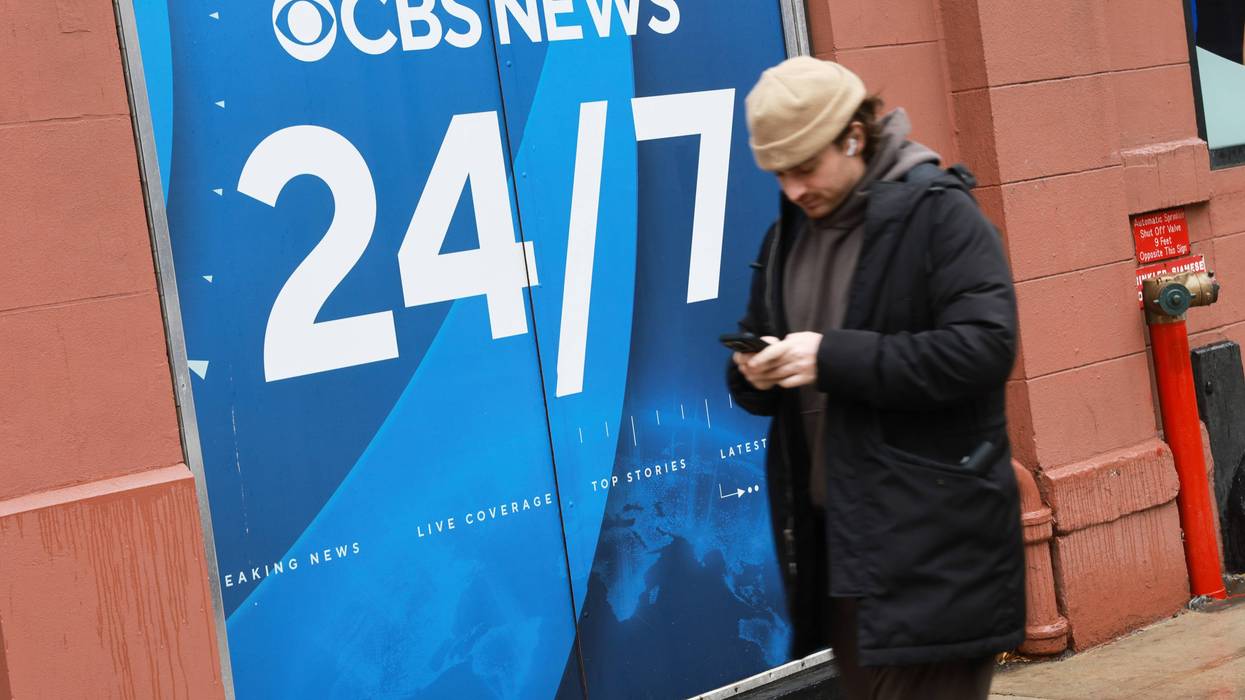 A person walks by the CBS Broadcast Center in Manhattan.