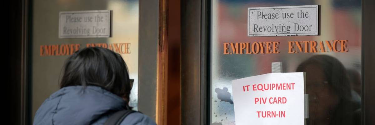 A person walks into VA headquarters.