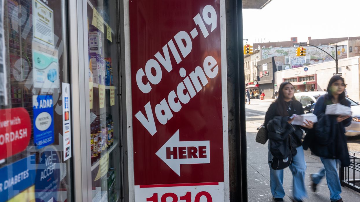 A pharmacy advertises the Covid-19 vaccine as the nation marks the fifth anniversary of the Covid-19 pandemic