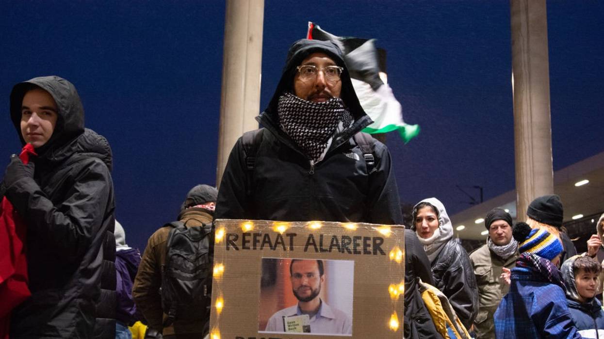 A photo of the renowned Palestinian poet Refaat Alareer, who was killed