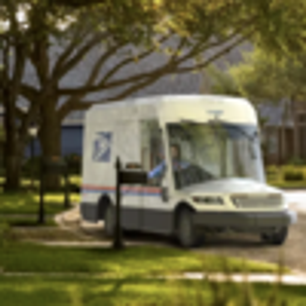 A photo shows an electric USPS delivery truck