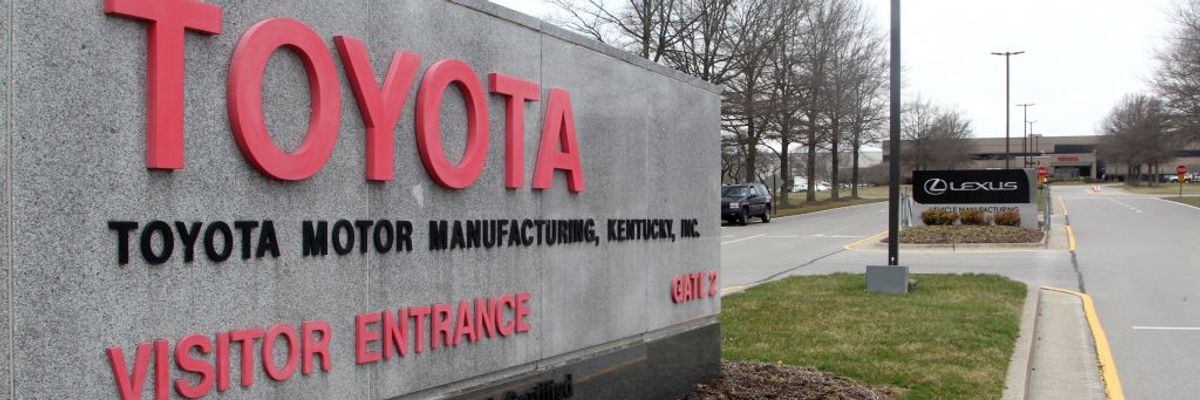 A photo shows the visitors entrance sign to a Toyota plant in Kentucky.