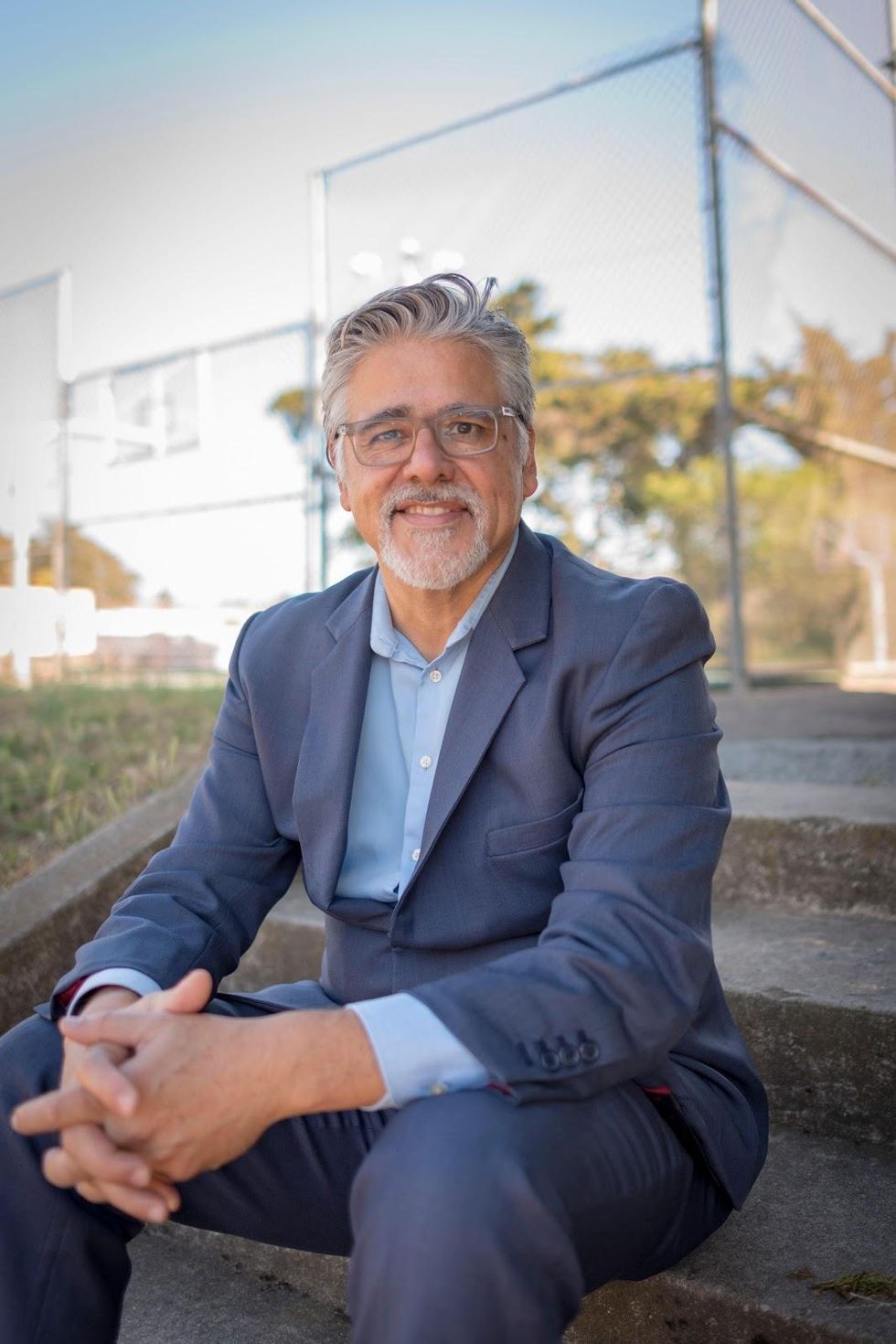 A picture containing person, outdoor, person, sitting</p>\n<p>Description automatically generated