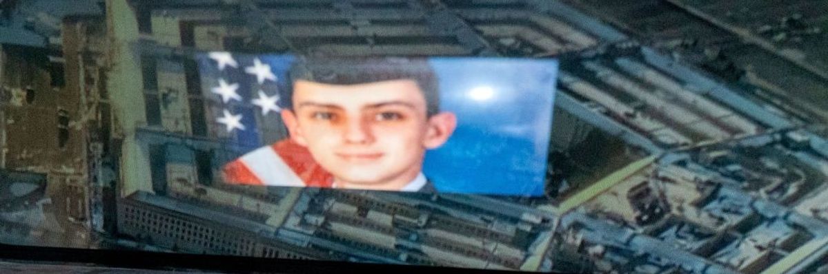 A picture of Jack Teixeira super-imposed on the Pentagon.