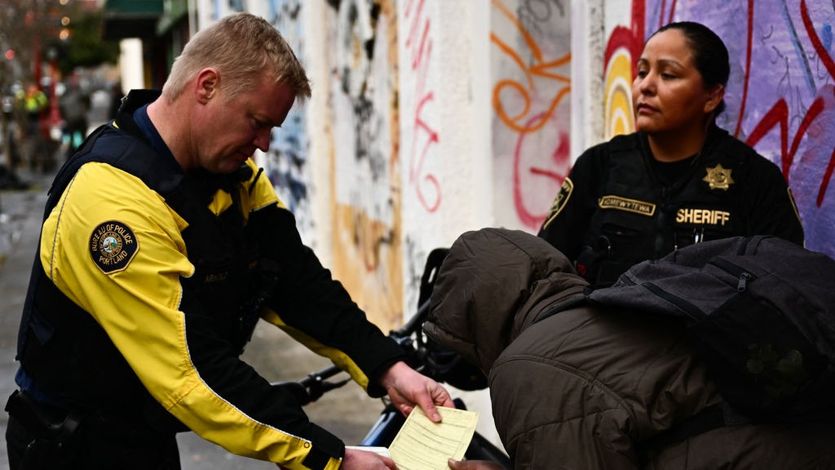 A Portland police officer issues a citation for drug possession