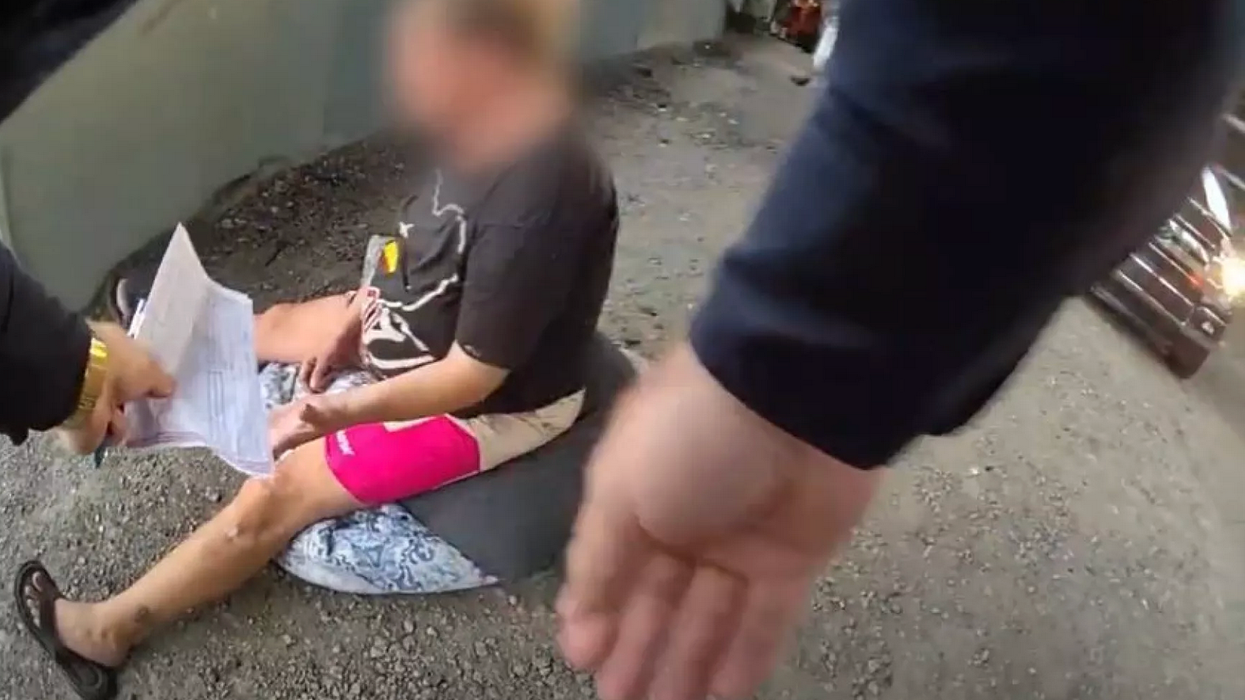 A pregnant woman was given a ticket while in labor