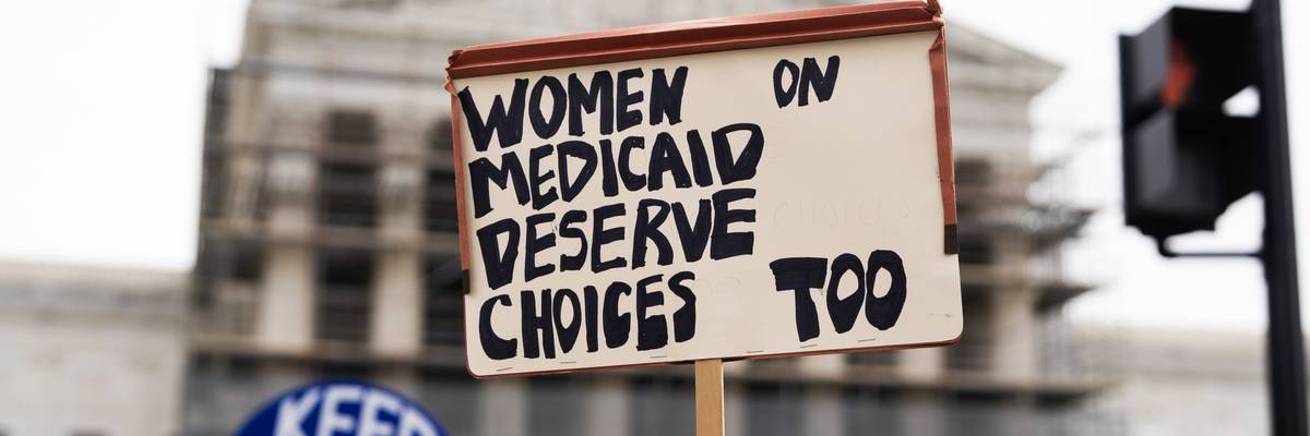 A pro-choice demonstrator holds a sign