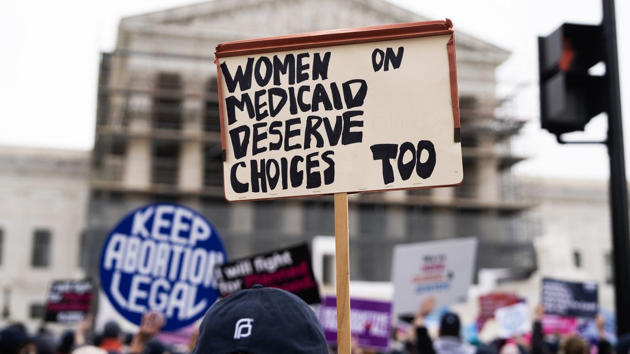 A pro-choice demonstrator holds a sign