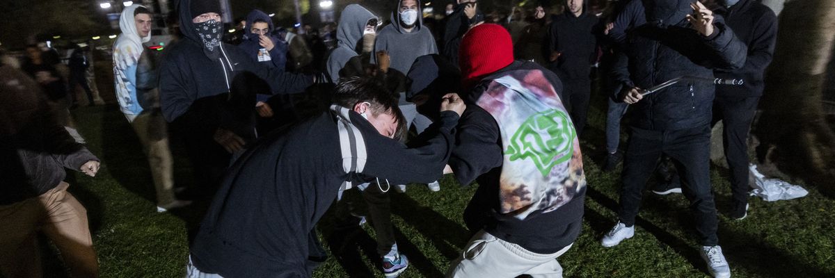 A pro-Palestinian demonstrator is beaten