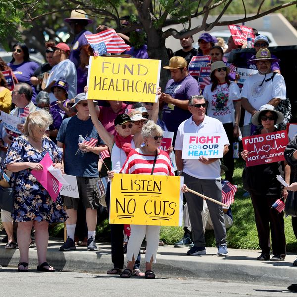A protest co-led by the California Nurses Assn. called on Rep. Young Kim (R-Anaheim Hills) to vote against President Donald Trump's spending bill that would slash spending on healthcare and other federal safety net programs while extending tax cuts outsid