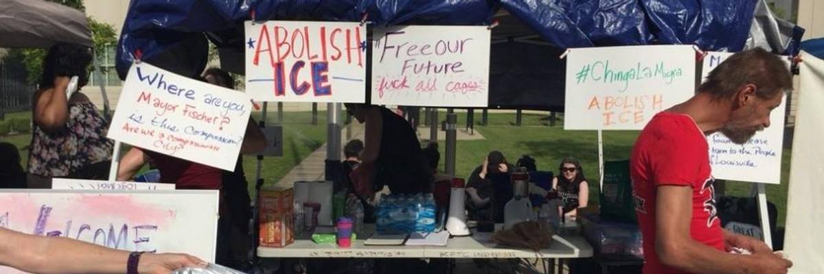 A protest encampment outside an ICE facility.