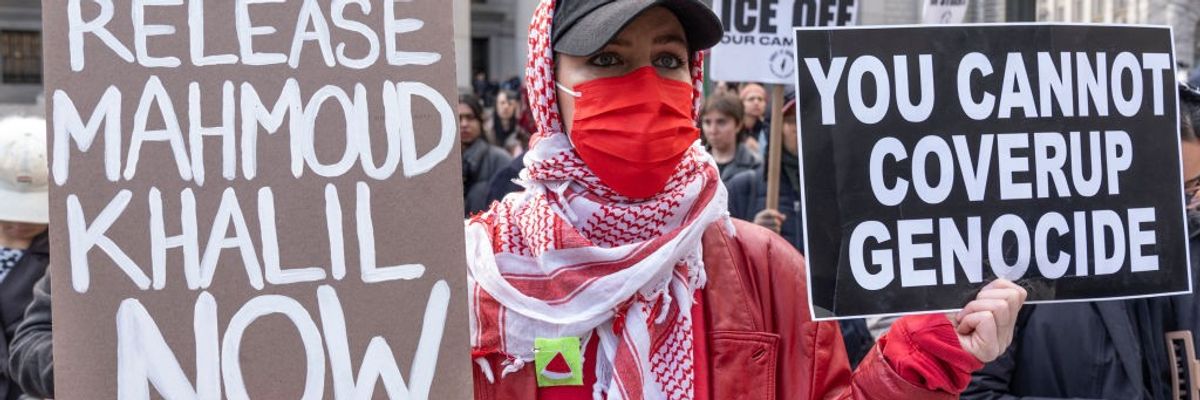A protester calls for the release of Mahmoud Khalil