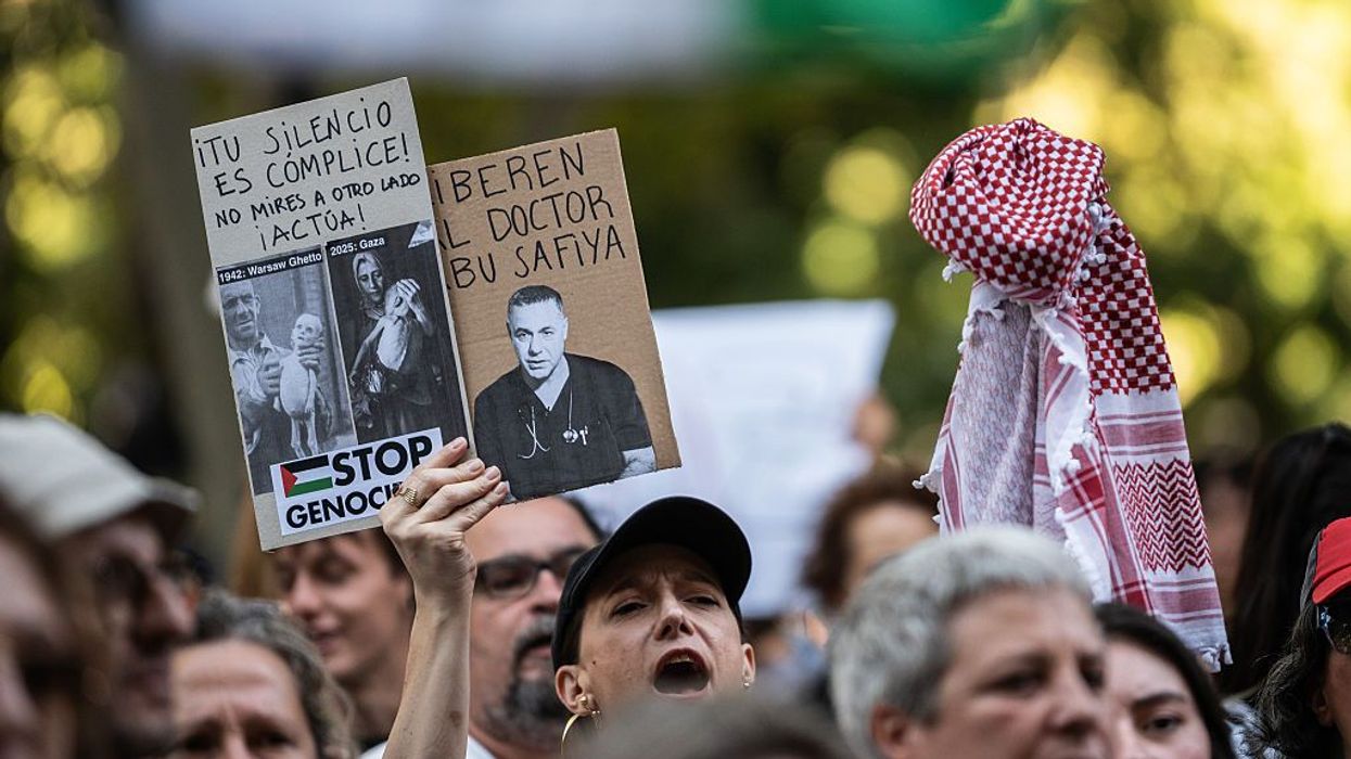 A protester holds a placard
