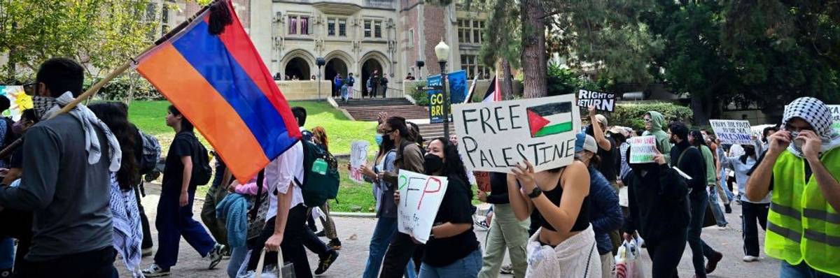 A protester holds an Armenian flag during a Gaza demonstration in LA