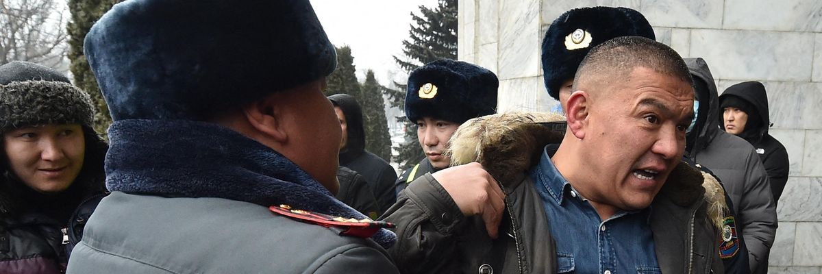 A protester is detained in Kazakhstan