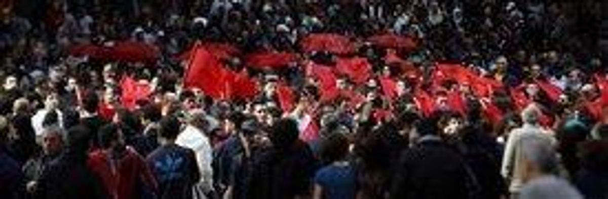 Tens of Thousands Protest Against Austerity in Rome