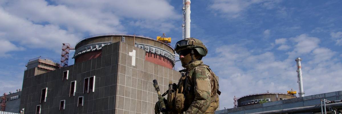 A Russian soldier patrols the territory of the Zaporizhzhia Nuclear Power Station in Energodar, Ukraine on May 1, 2022.
