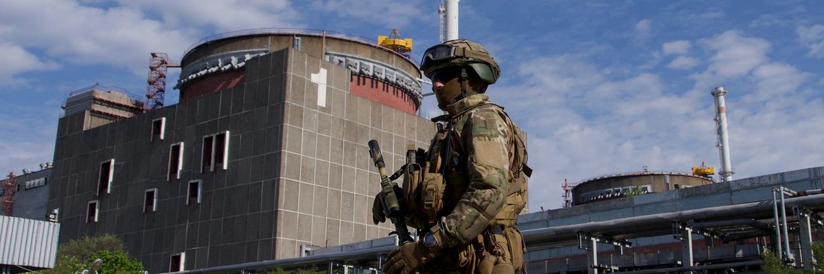 A Russian soldier patrols the territory of the Zaporizhzhia Nuclear Power Station in Energodar, Ukraine.
