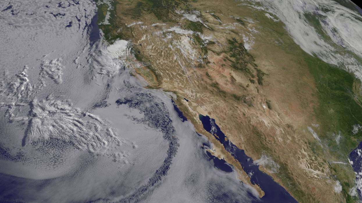 a satellite map showing clouds over the California coast and Pacific Ocean