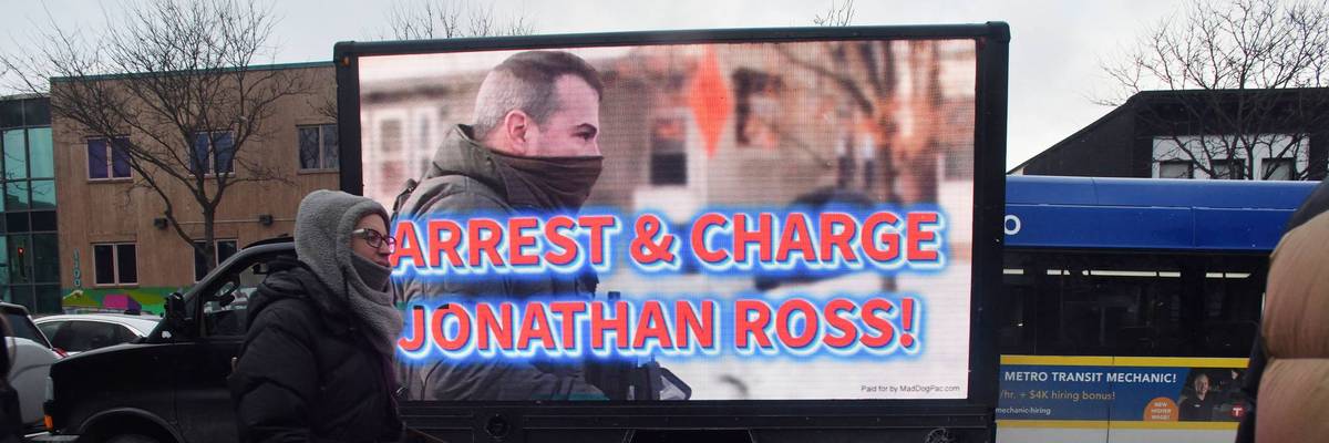 A screen reads, "Arrest and charge Jonathan Ross."