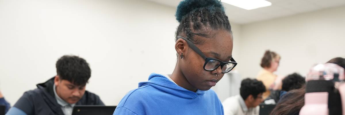 A Sharpstown High School junior works on an in-class assignment