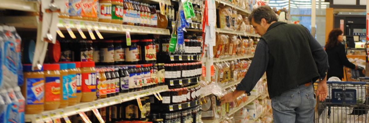 A shopper in a grocery store.