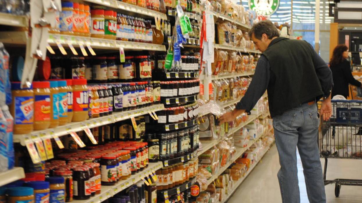 A shopper in a grocery store.