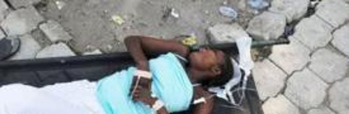 As Cholera Spreads, Heavy Rains Wreak Havoc in Haitian Camps