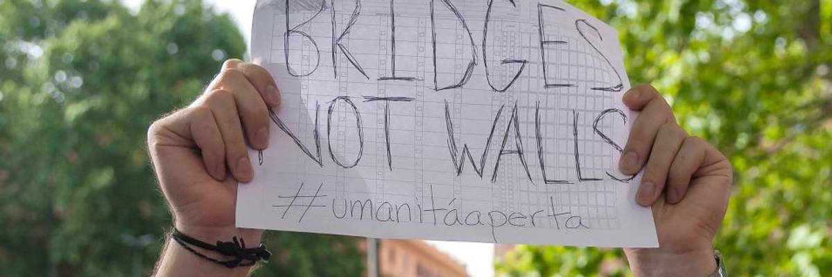 'New Walled Order' for Migrants Worldwide as Governments Criminalize Compassion and Erect Barriers to Basic Services